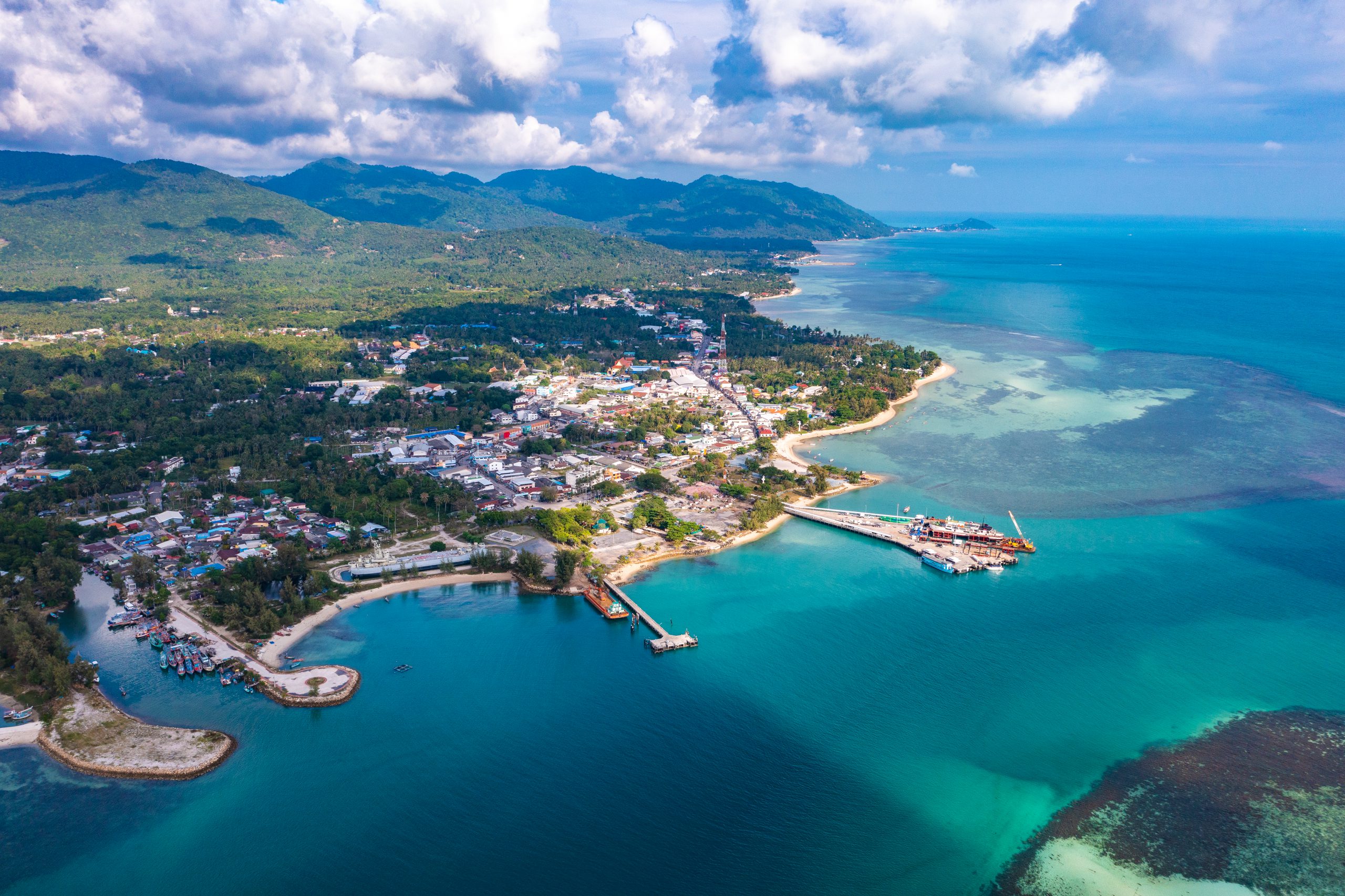 Aerial view of Thong Sala pier, boat and koh Tae Nai in koh Phangan, Thailand